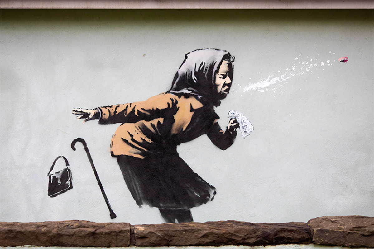 Banksy street art depicting sneezing woman appears on English home