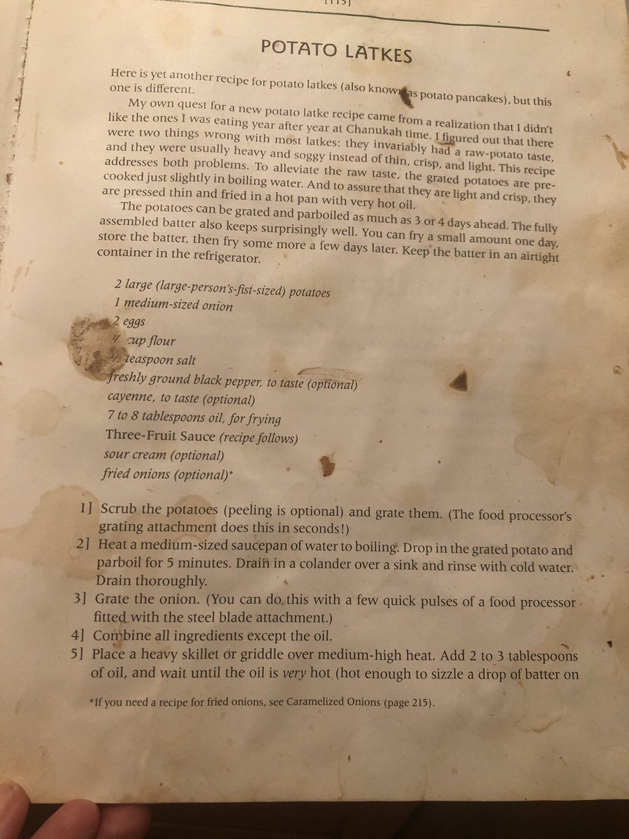 Tristanshouts's tweet photo. Best latke recipe, courtesy of @MollieKatzen, from #StillLifeWithMenu - the first cookbook I bought post-college, along with her #MoosewoodCookbook. You can see all the oil splatters on the page. A cookbook well used & well loved! https://t.co/2MK2RFuAqk