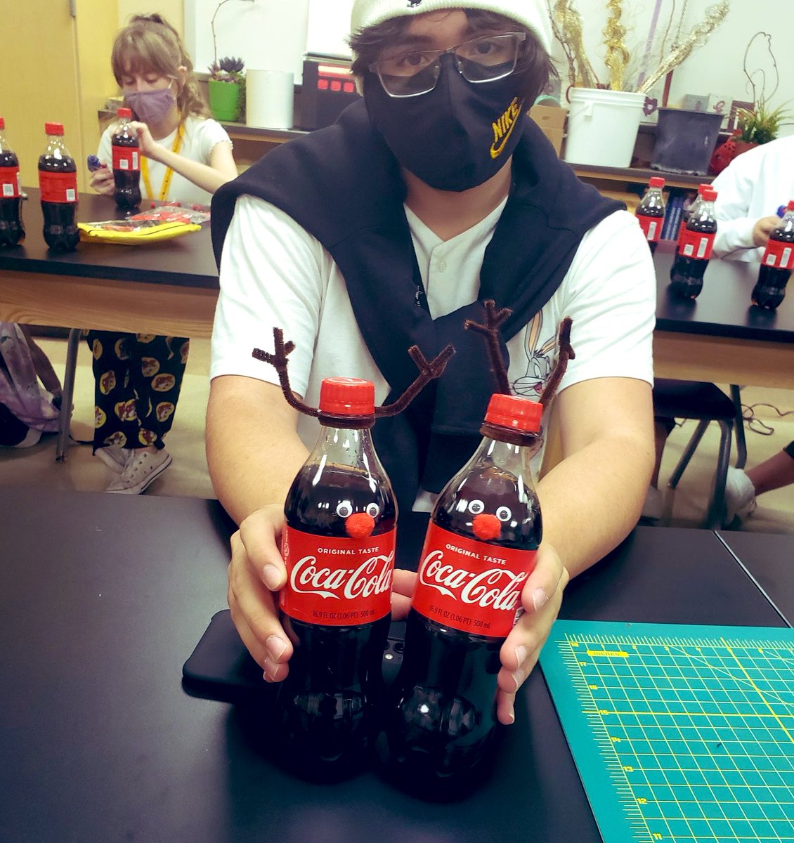 pinkpatterson's tweet photo. 2020 has been a bit SALTY...but my @WeAreGRHS staff is oh so SWEET....so it was time for some fun reindeer treats! Thanks to our @GRFFASchroeder Floral Design classes...we had a herd of 212 @CocaCola Reindeer! #WeAreGR #candypopcorn #12DaysOfXmas2020 https://t.co/3lXooX43ey