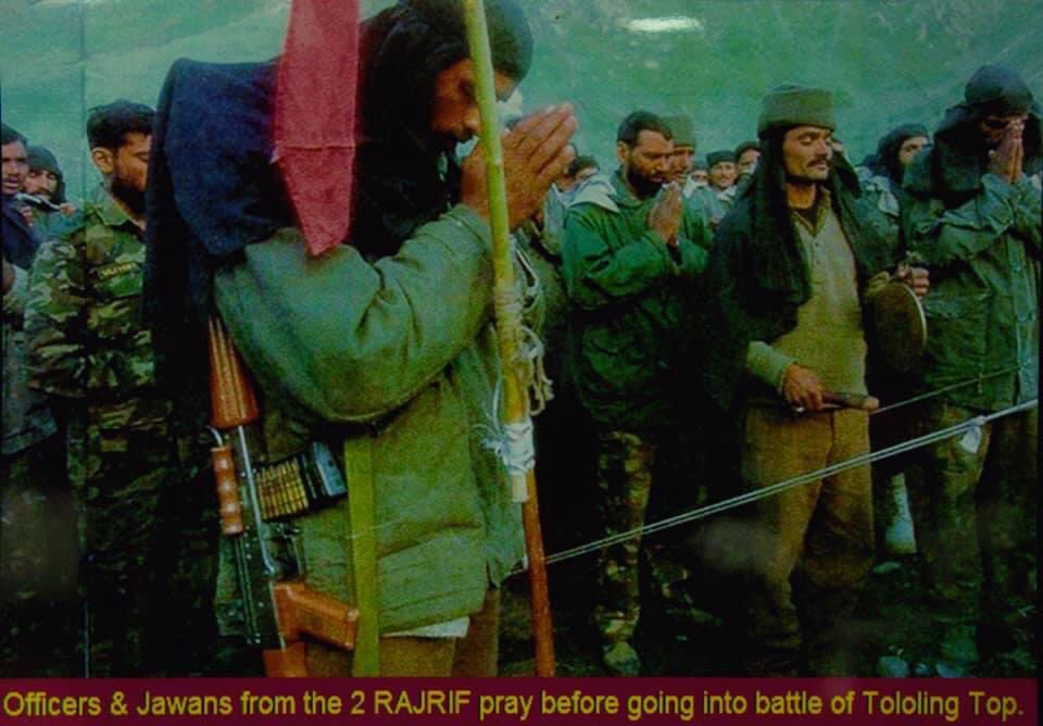 Officers & Jawans from the 2 RAJRIF pray before going into battle of Tololing Top.The attack on Tololing commenced at 2030 hrs on the night of 12 June 1999. There was extreme tension in the Operation Room as well as amongst the attacking troops. +