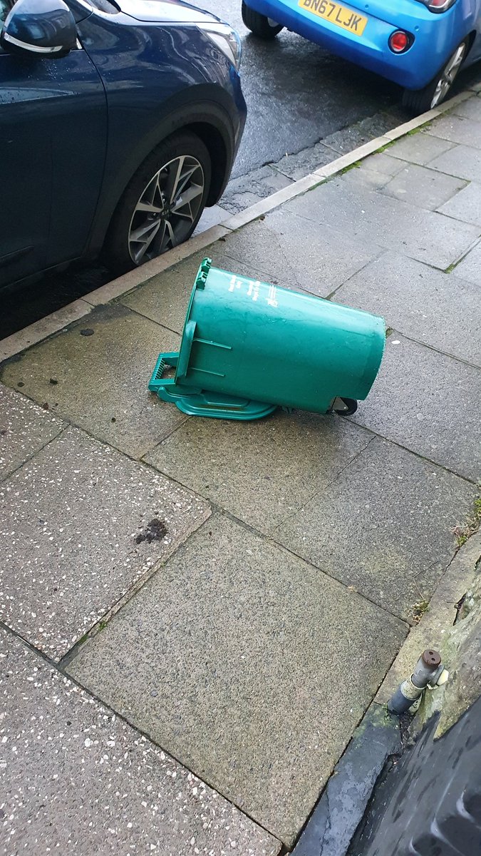 Mike_watson86's tweet photo. @RCTCouncil can you tell me why every time the bin men take my food recycling bin they either dump it three doors down or thrown on the floor like this everytime https://t.co/x14xlvULOH