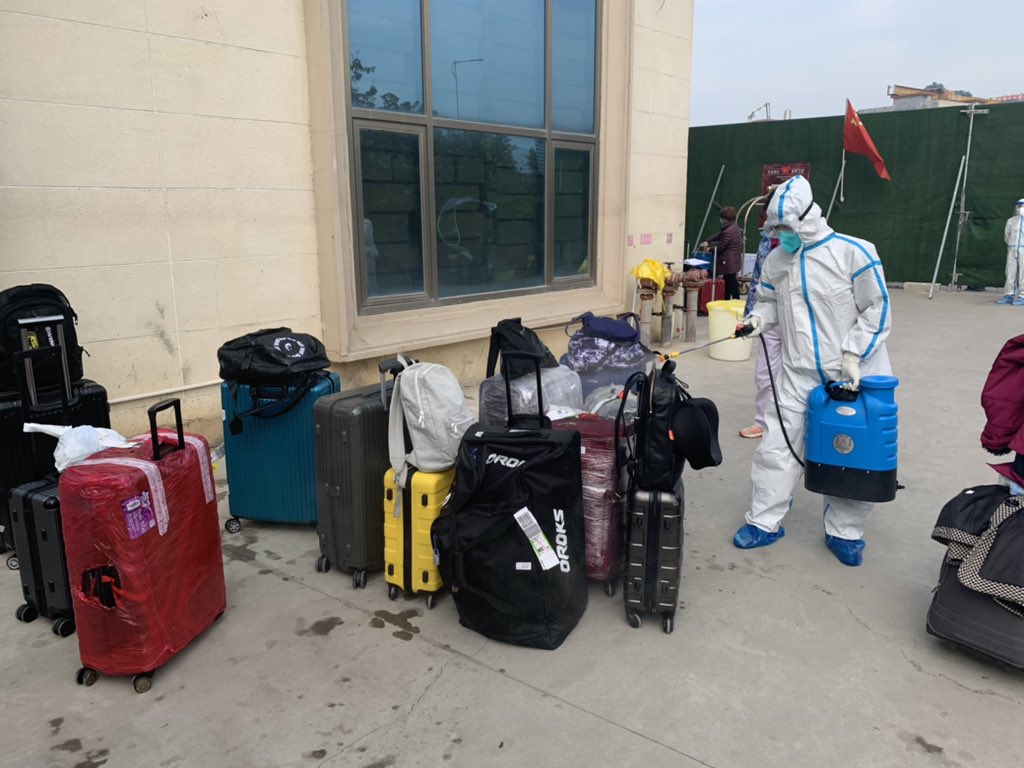 At my quarantine hotel, again the staff members were fully geared up. Our luggages were collected and aggressively sprayed with disinfectants.One woman complained that her bag is not waterproof. But most people, myself included, were glad since it saved us a lot of trouble.