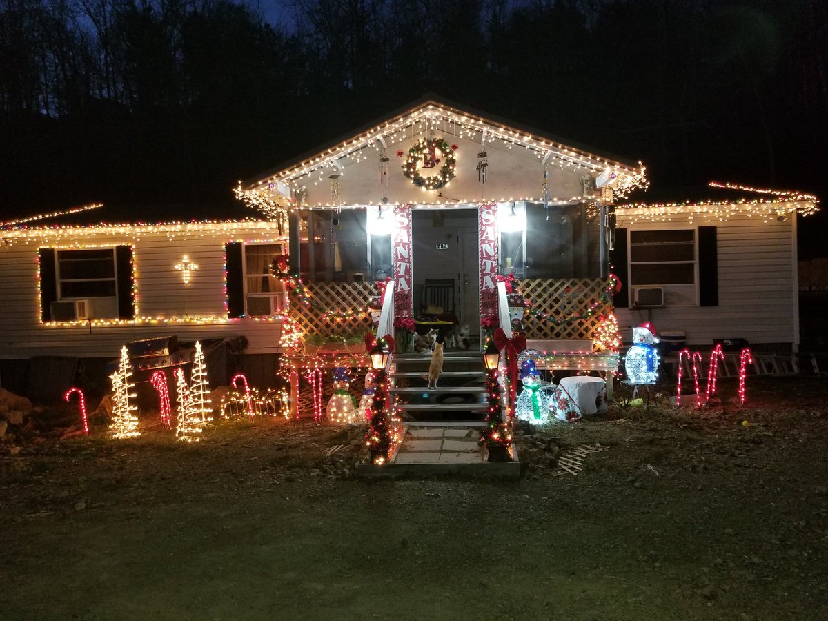 Our house at christmas.. Santa will be here soon standing in the doorway..