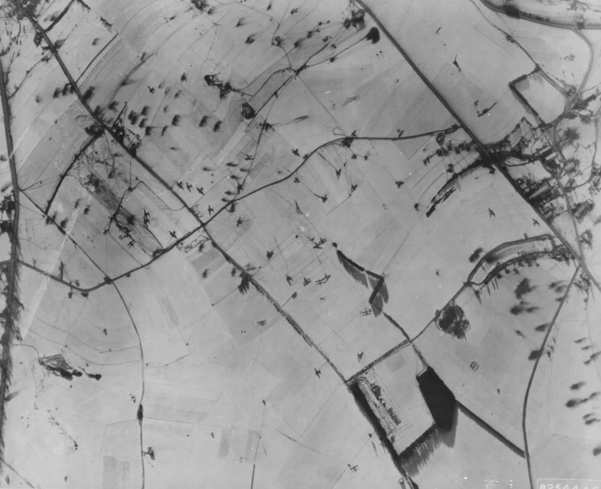 from the 440th TCG. Due to the lack of Glider Pilots in France at the time, and the rapid nature of the planning, there are no co-pilots. 12 GP's are captured by the Germans, are 4 are KIA. This aerial photograph shows Gliders on the ground at Bastogne.