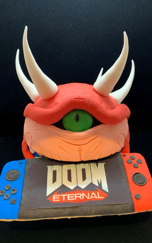 Bethesda_UK's tweet photo. To celebrate the launch of #DOOM Eternal on Nintendo Switch we asked @agentsofcake to bake up this Cacodemon pal who wants a turn.

Can confirm he was as delicious as he is deadly!

#Nintendo #Switch #cake https://t.co/fi8pdPMo5X