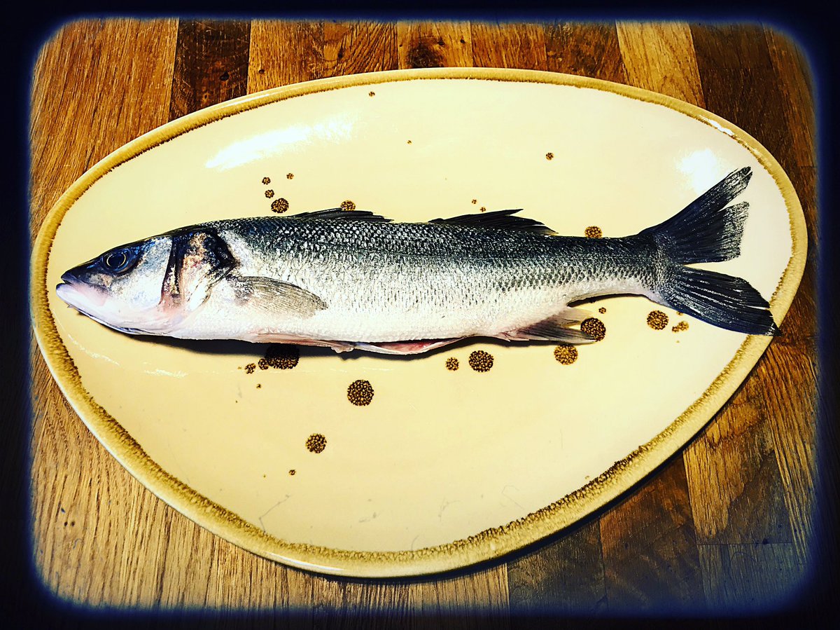 Whole grilled sea bass, chermoula and golden raisin butter, sautéed kale, available for takeaway tonight and Saturday