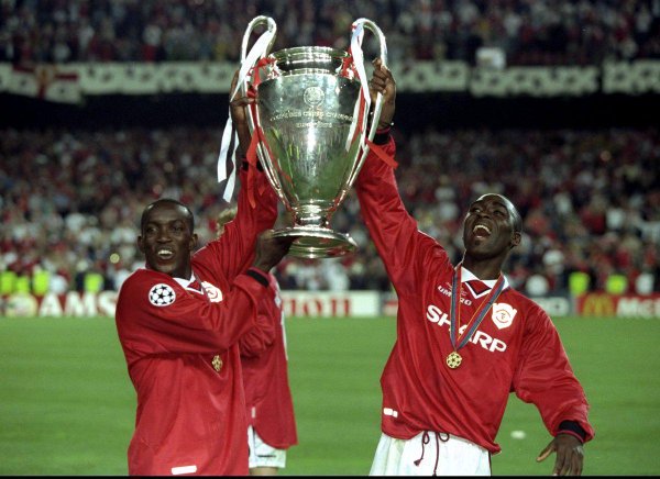 Dwight Yorke and Andy Cole celebrate winning the Champions League, 1999.