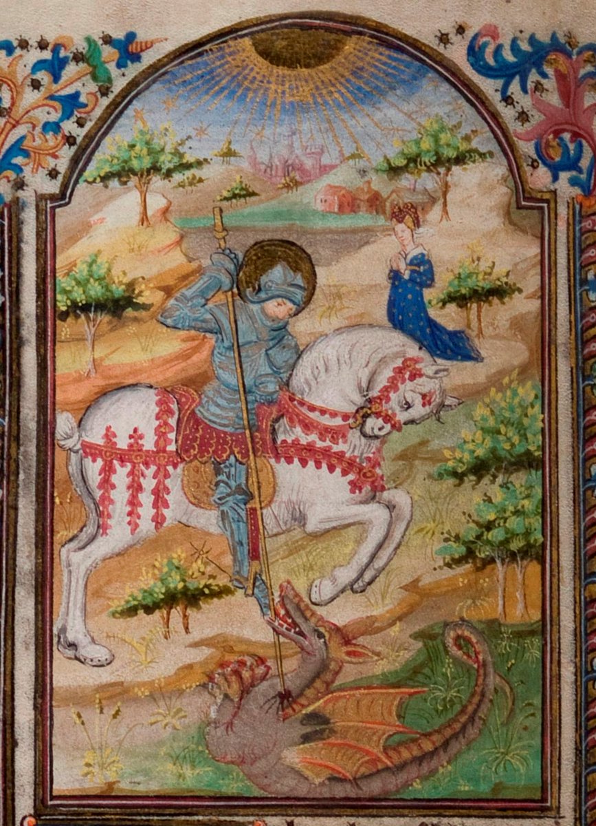 The miniature on folio 41v shows a dramatic scene of St George slaying a dragon. The Princess (the ‘damsel in distress’) whom St George saves from being sacrificed to the dragon can be seen in the background, kneeling on the hillside in prayer.  #BookofHours