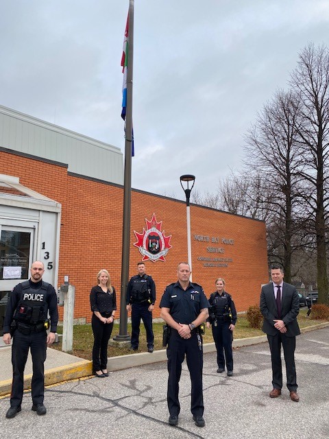 NorthBayPolice's tweet photo. Honor for Cst Hovingh, NBPS flags at half mast, #5661, #HeroesinLife and #halfmastforMarc. https://t.co/V7QlldxJlu