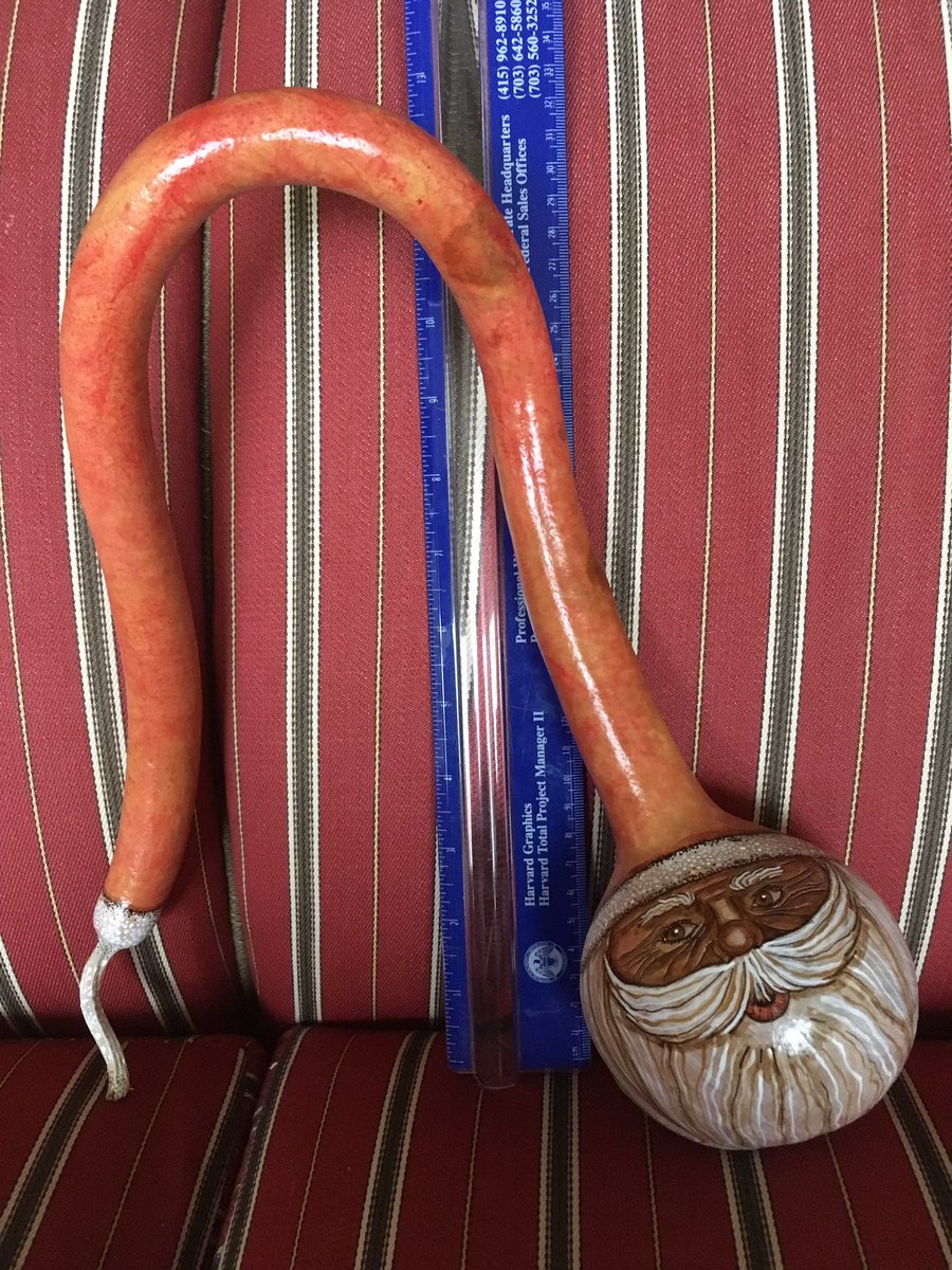 Another curly capped Santa Gourd head ready for spray varnishing! This one needs a stand to remain upright: