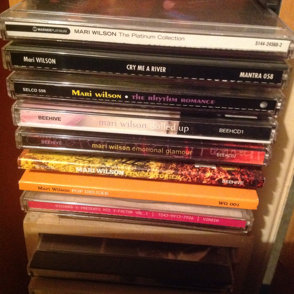 dearianfawn's tweet photo. My #RichardX Presents Vol 1 looks slightly incongruous next to my #MariWilson collection - the perils of alphabetical order @MissBeehive https://t.co/n3wMT0HjO6