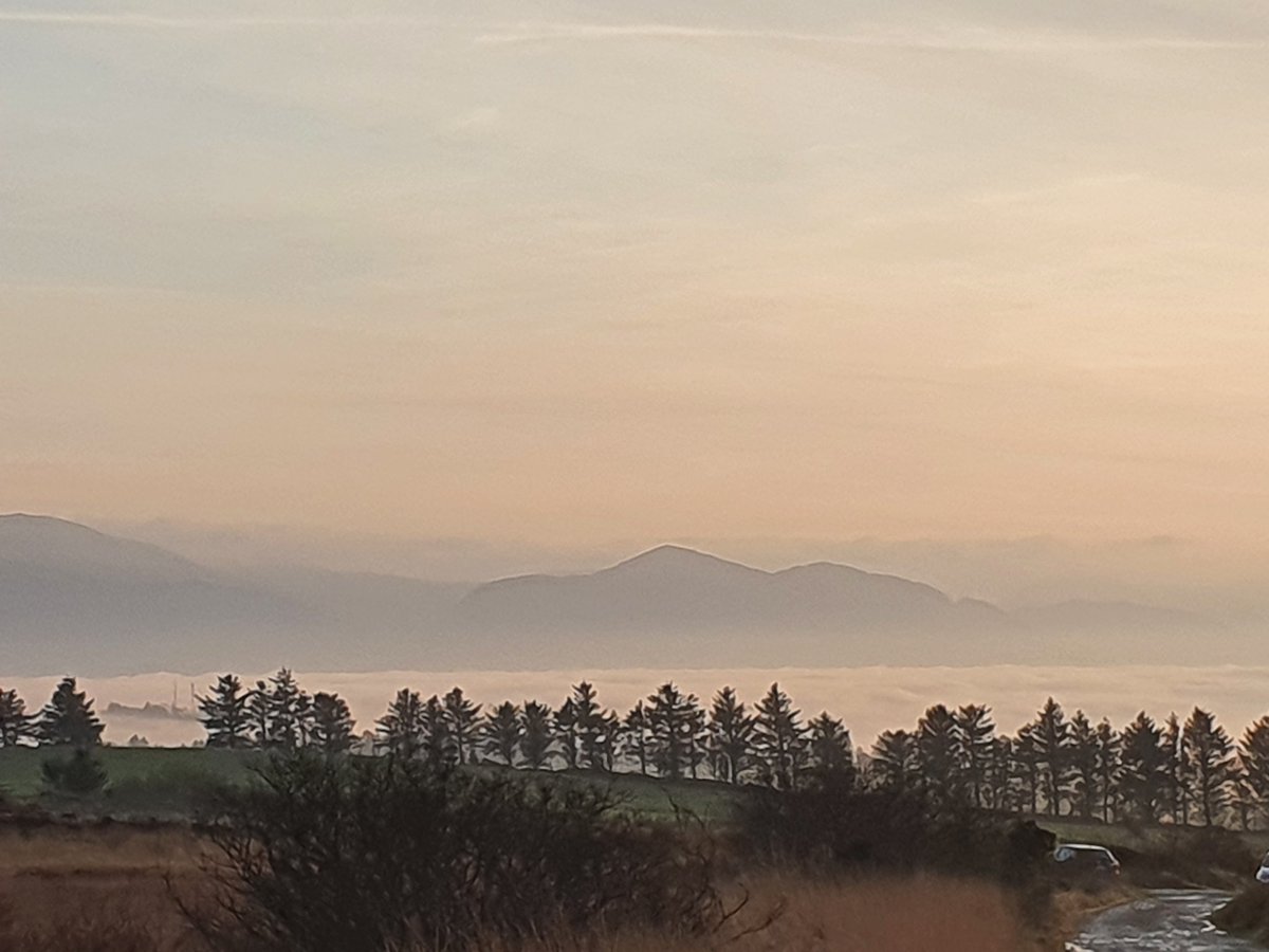 Beautiful evening for a bog walk in Kilcummin, sunset ,moon in a clear sky and Killarney under a blanket of fog.