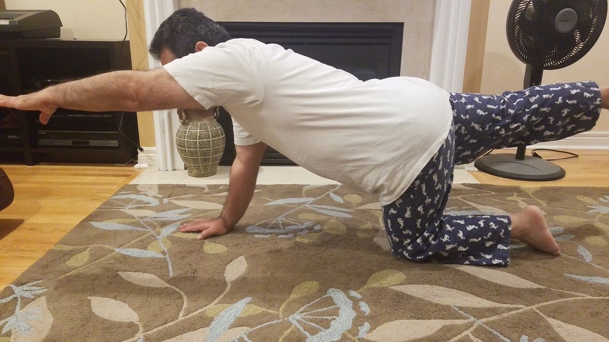 insha_teach's tweet photo. For this week's session, I taught my dad a stretch where he extends one arm and one leg. This is to help improve balance and strengthen his lower back. #letsteachadults @YEPeducation https://t.co/aiHzOVsjmK