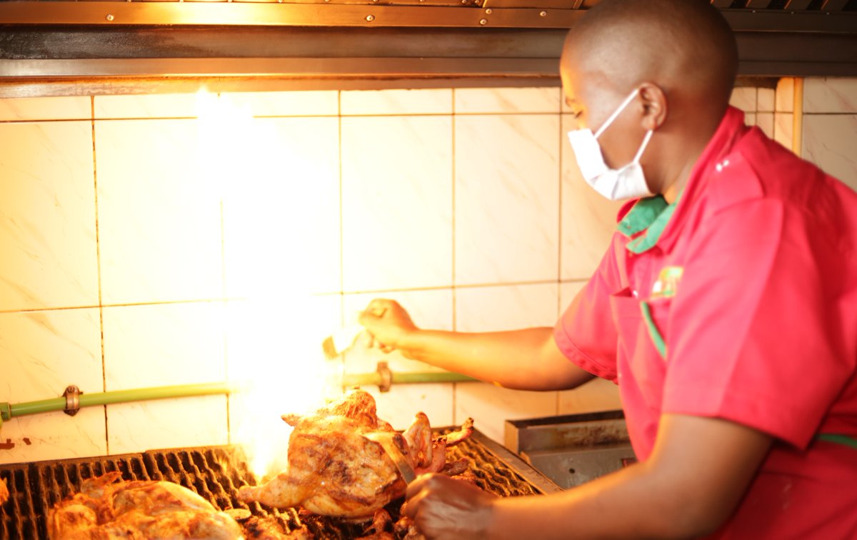 FlameGrillKE's tweet photo. When we say Flame Grilled Chicken, we really mean it. 

Here is our Grill Master in action at our Donholm Restaurant flipping the chicken to make sure that it has those beautiful sear marks on each side. This gives it an elaborate flavor profile from the marinate. https://t.co/ovS0jkUBoq