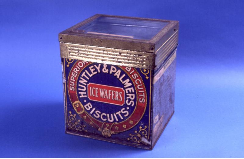 Huntley's son, also called Joseph, was an ironmonger across the road.Together, the Joseph Huntleys recognised the potential for selling biscuits farther afield, by transporting them in boxes made of tin. Like this one: a later model, from the 1950s, that looks like a GameCube.