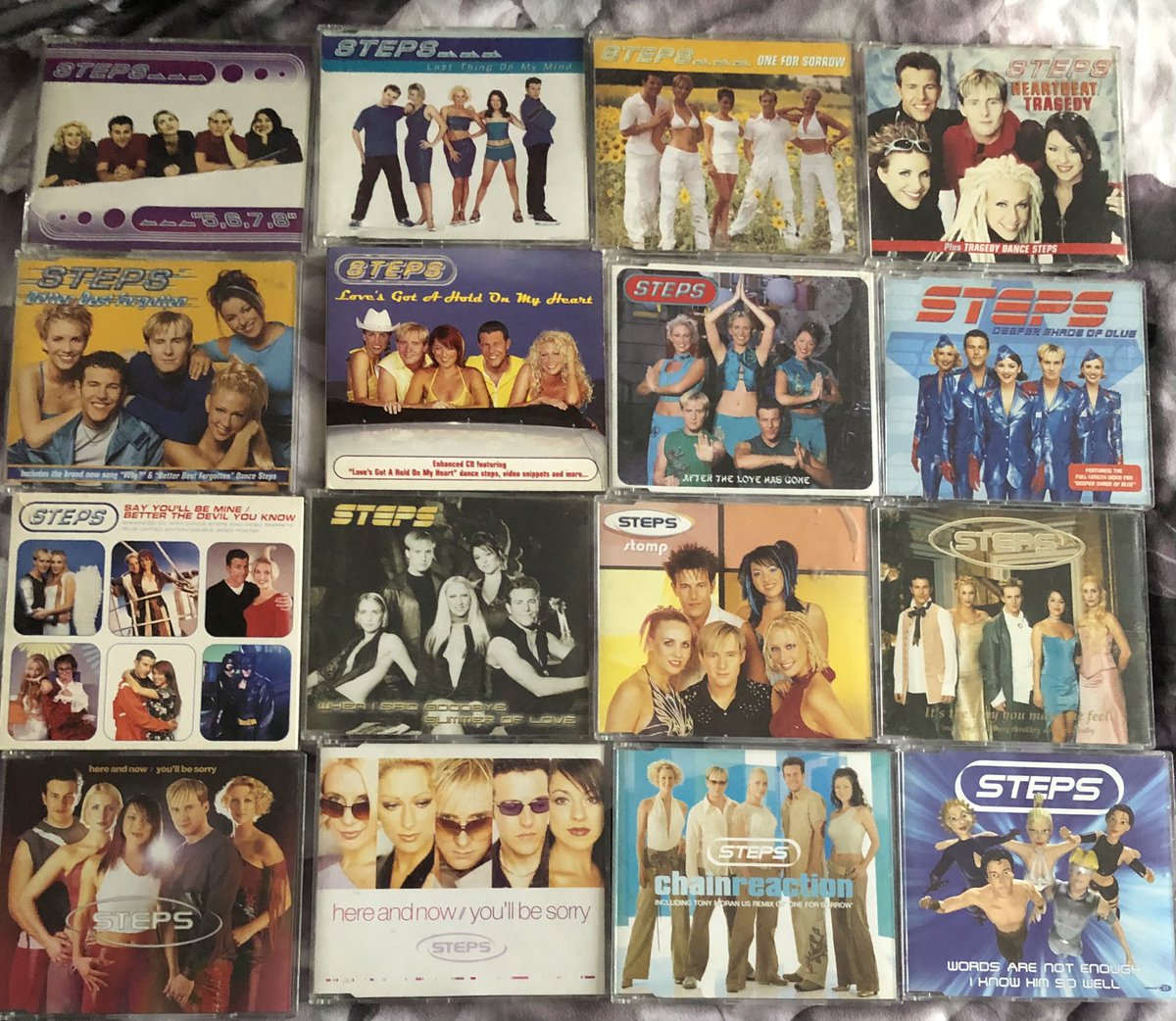 deanjenkinson's tweet photo. Just had to get this lot out today to reminisce 😍😍😍 #onefootinthepast @OfficialSteps @Ianhwatkins @_ClaireRichards @llatchfordevans @LSLofficial @Faye_Tozer #whatthefutureholds is just the next epic journey! happy stepper 😁🕺🏼💜🔮💜🕺🏼😁 https://t.co/8jV7ORFxVc