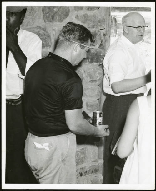 ...based on eyewitnesses and this photograph by Georgia investigator Ed Friend, showing a man holding a beer(Champagne Velvet for those interested). (The back of the photograph is stamped with a logo that says "Brotherhood by Bayonet", a protest slogan against integration.) 40/