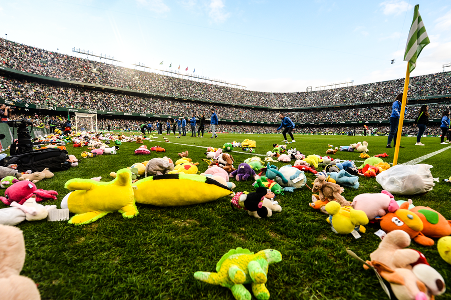 brfootball's tweet photo. Real Betis can’t do their traditional toy throw this year, so they filled their empty stands with toys today. 

The club will donating a toy to children for every one bought by fans during the holidays 💚 https://t.co/7N9DbCrARJ