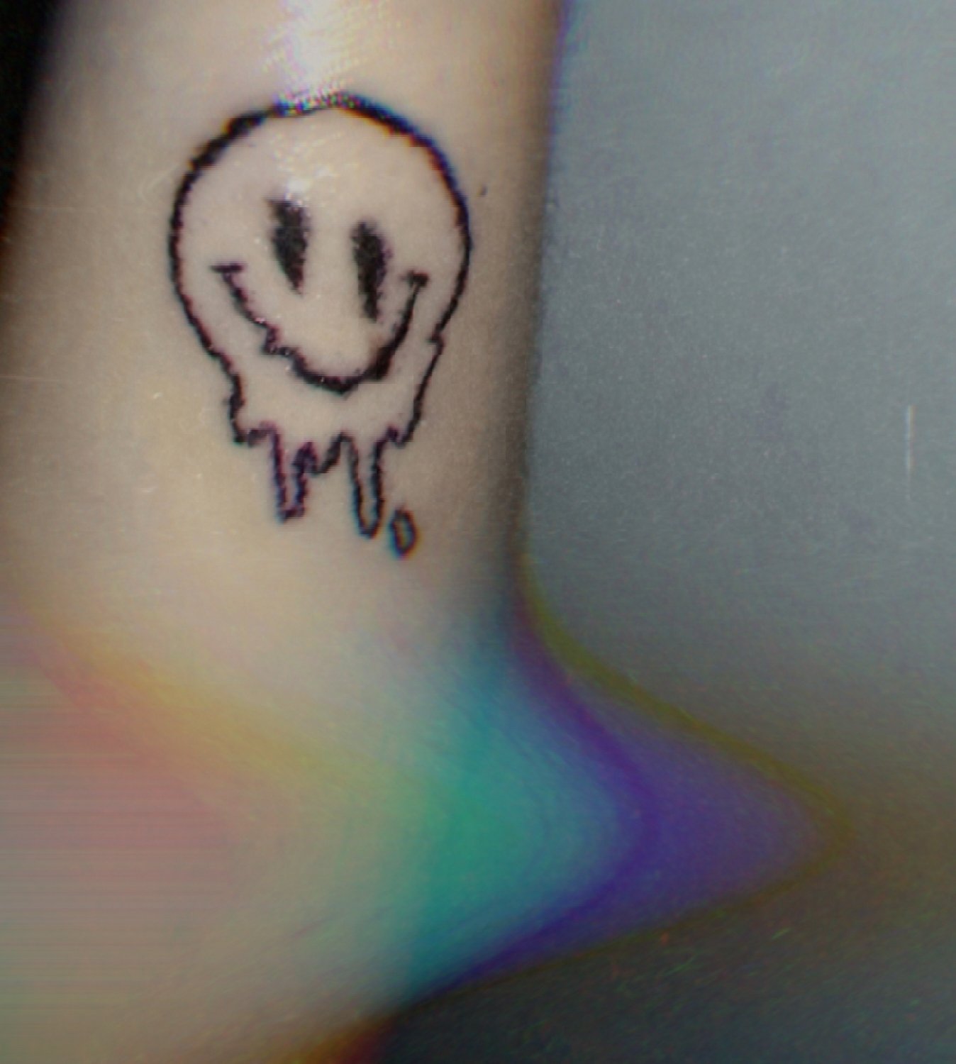 18 Cheerful Smiley Face Tattoo Designs  Moms Got the Stuff