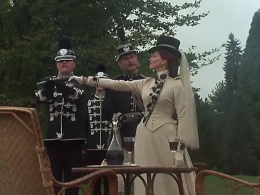 her next appearance is in a series of flashbacks, narrated by the king when he visits holmes. the riding habit she wears here is one of my favorite costumes on the show!