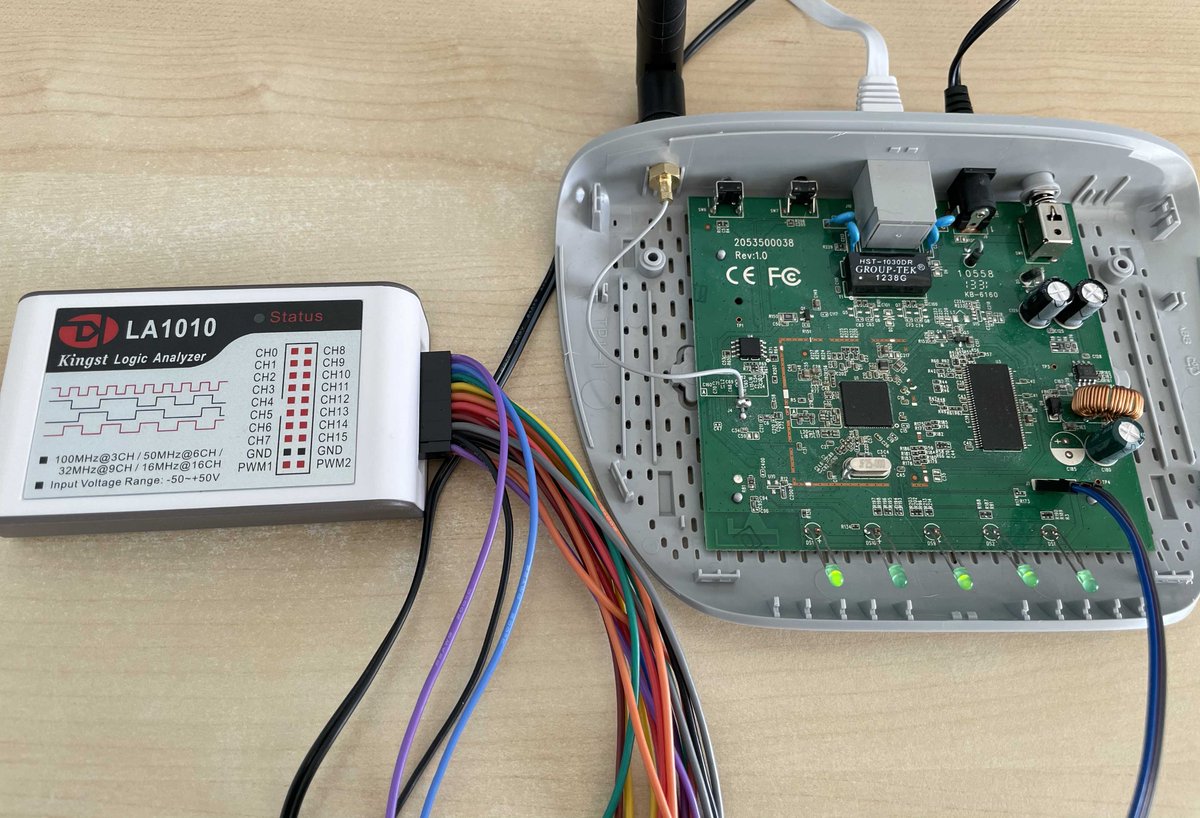 After a quick check with a multimeter to make sure the voltages won't fry my laptop, I connect up a Logic Analyser to work out if there is anything transmitting on any of the pins. I let the analyser work out the baud.Bingo - we have serial data on 115200 baud!