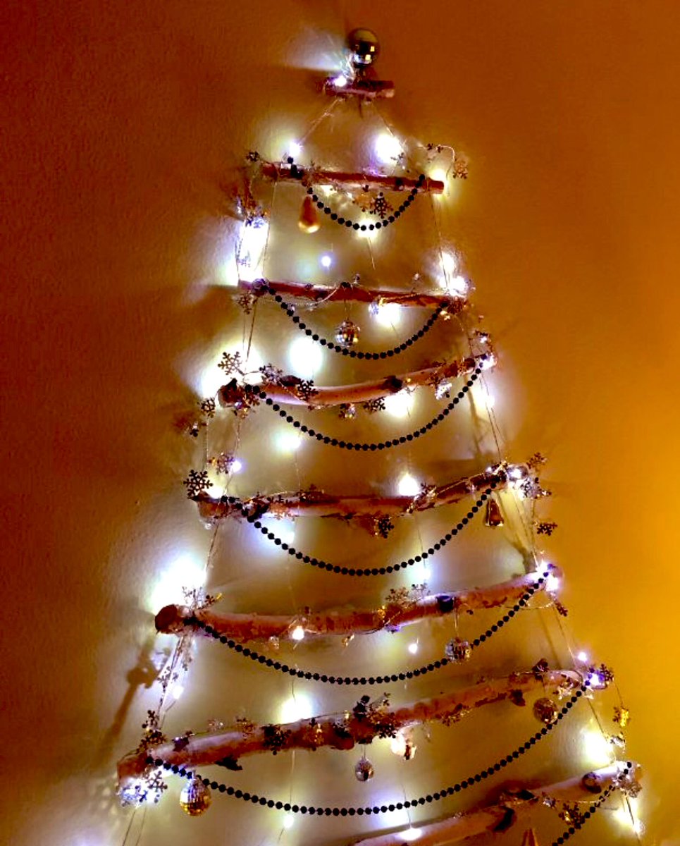 A flat Christmas tree will drive your cats up the wall. Whatever wall you’ve used for your 2D Christmas tree, to be specific. || #CatsHateChristmas