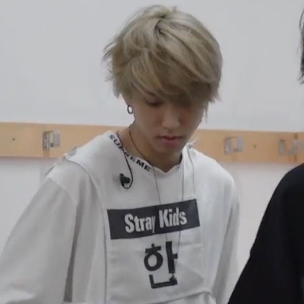 a thread of han jisung with messy hair
