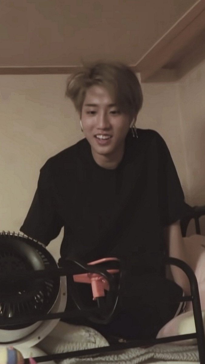 a thread of han jisung with messy hair