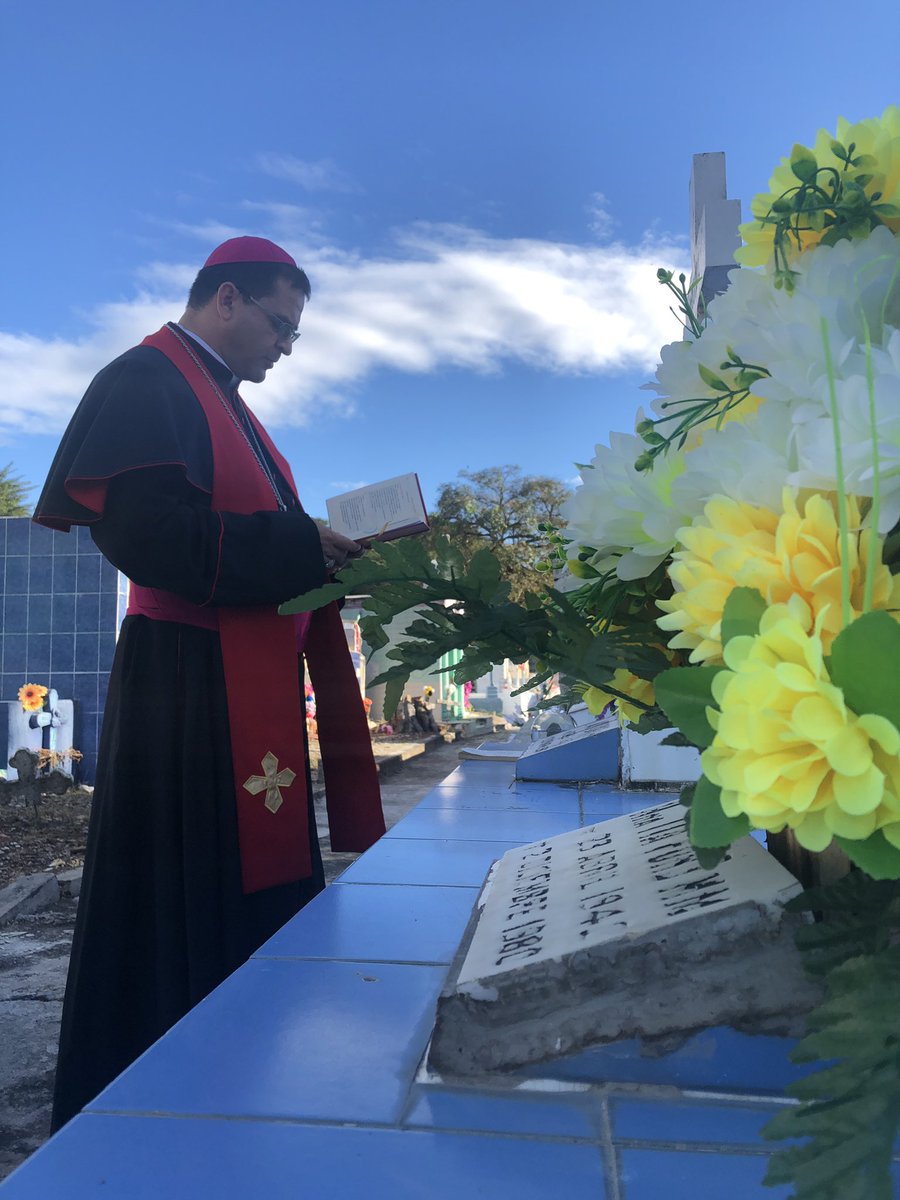 A group has gathered by the tombs of the  #maryknoll sisters on the eve of the 40 th anniversary of their martyrdom. The bishop came to bless alone to avoid crowds gathering but a group walked in as he was leaving and they asked him to stay