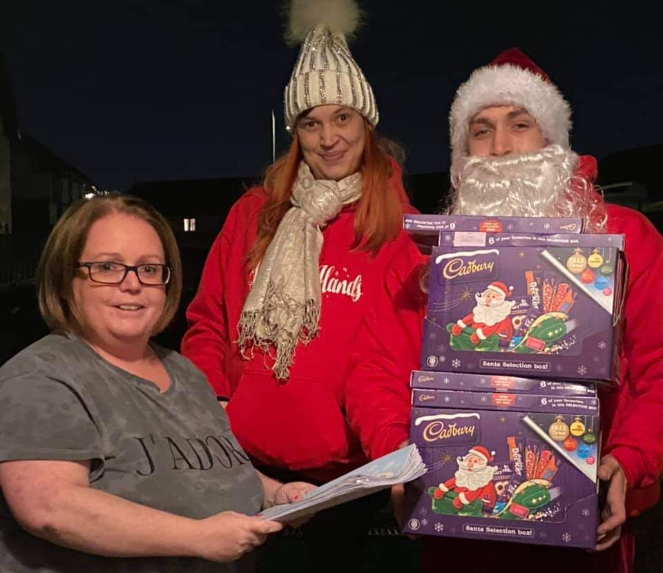 AutismCoast's tweet photo. Thank you Sean &amp; Letitia Helping Hands Hamilton for the delivery of Selection Boxes and colouring books from all @AutismCoast. These items will put a smile on local autistic childrens faces 🧑‍🎄🎅🏼 
https://t.co/jtKQOJPH0b
#autismsupport #CommunityCan  #actsofkindness #thankyou https://t.co/Z5qcL7zgoZ