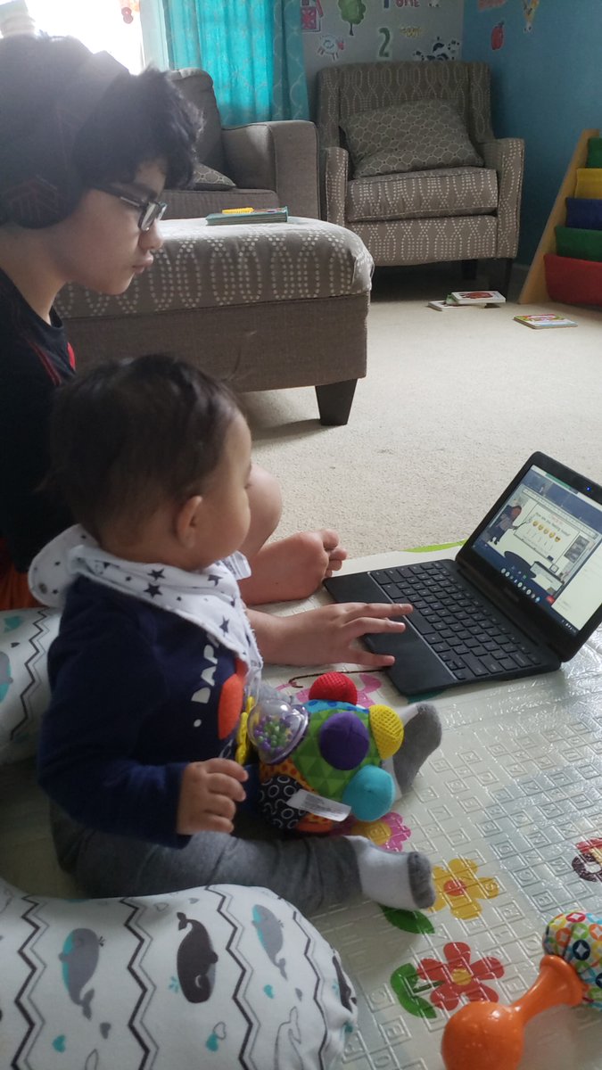 PrinceEdwardSch's tweet photo. Even the tiny siblings enjoy virtual learning! #EaglePride
#DigitalTogetherness https://t.co/cw2l0qV484