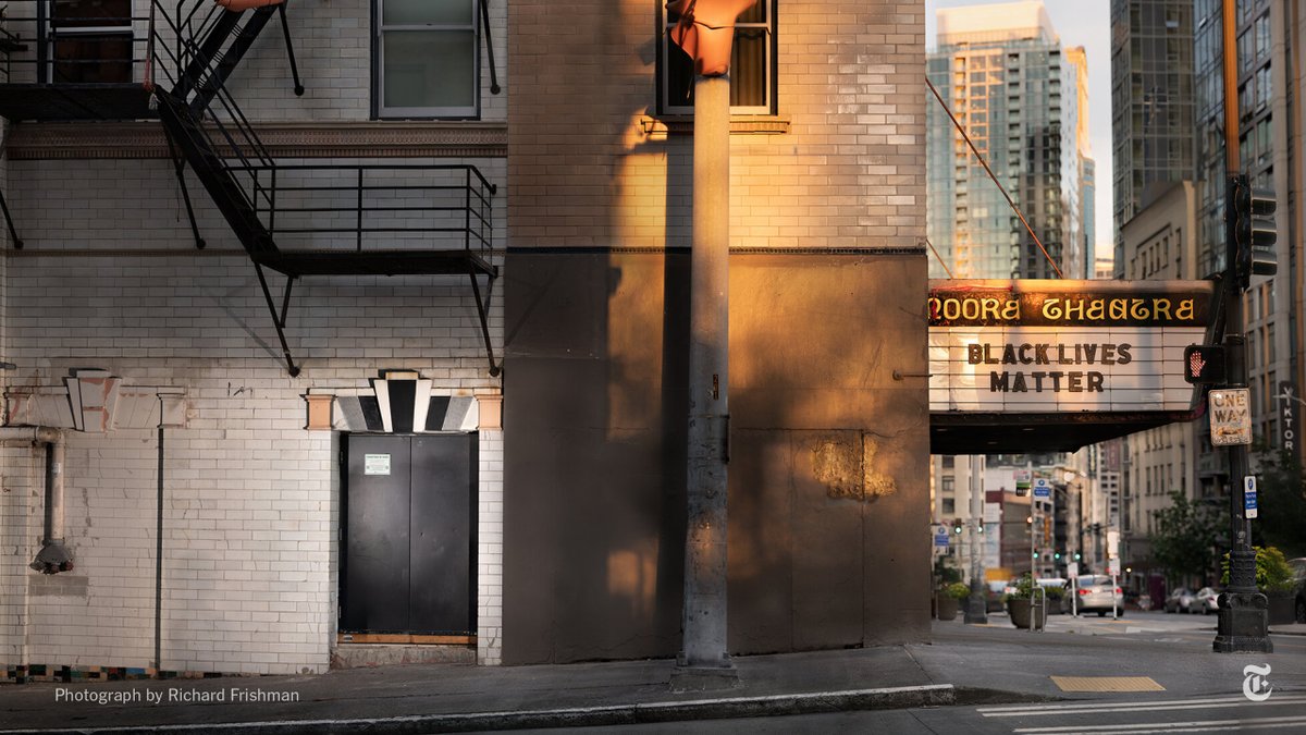 The locked black double doors aside Seattle’s Moore Theatre might be mistaken for a service entrance. “It wasn’t until the summer of 2020 that the tragic nature of this obscure door resonated with the sobering reminder on the marquee,” writes Frishman.  https://nyti.ms/2KXixOJ&nbsp;