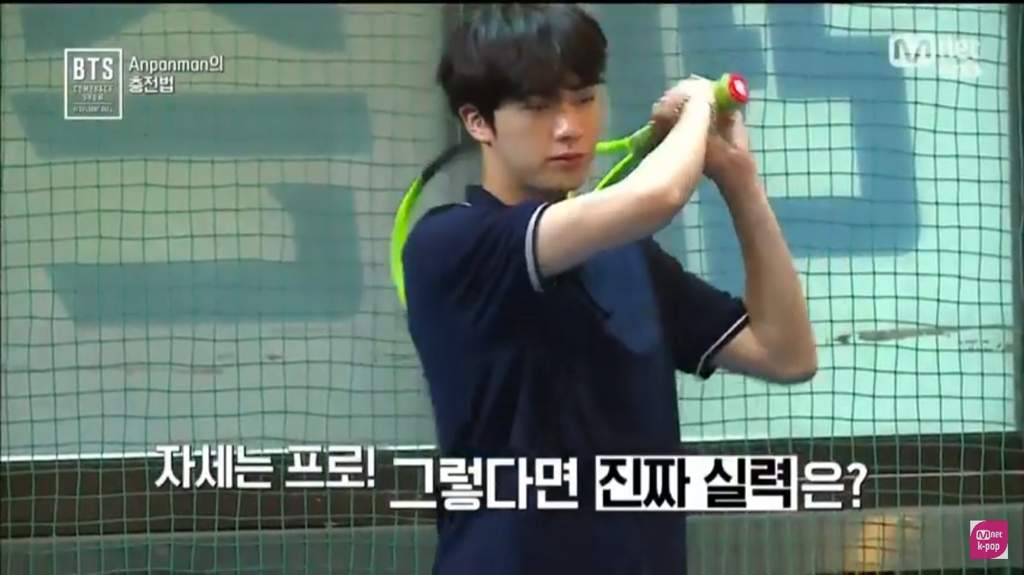 His playing tennis