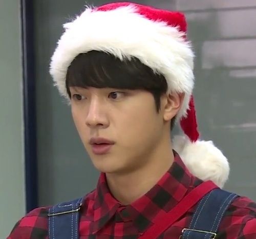His using a Christmas hat 