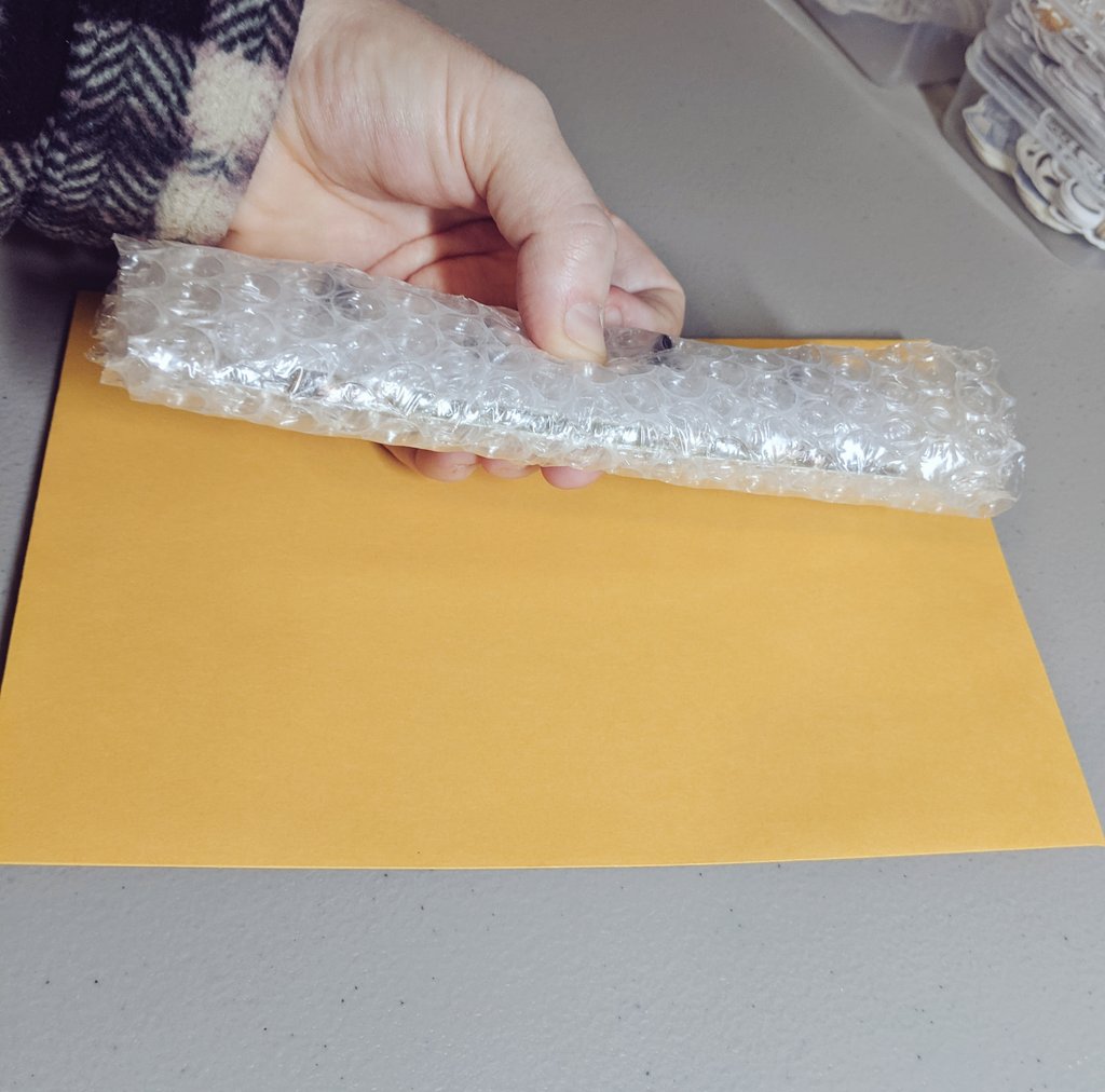 For 3-4 pins I use a larger strip of bubble wrap and nestle the backing cards together to reduce surface area before wrapping them the same way. It fits with room to spare in an 5x9 envelope. You can do 2 rows to easily fit 8 pins in a small envelope.