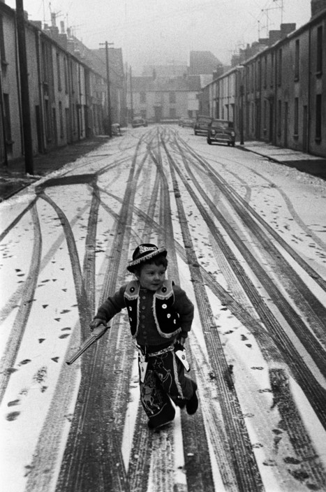 Day 2.The Ghosts of Christmas past  #AdventCalendar.A boy in his new Cowboy outfit, Wales, 1962.Photo Dennis Stock/Magnum