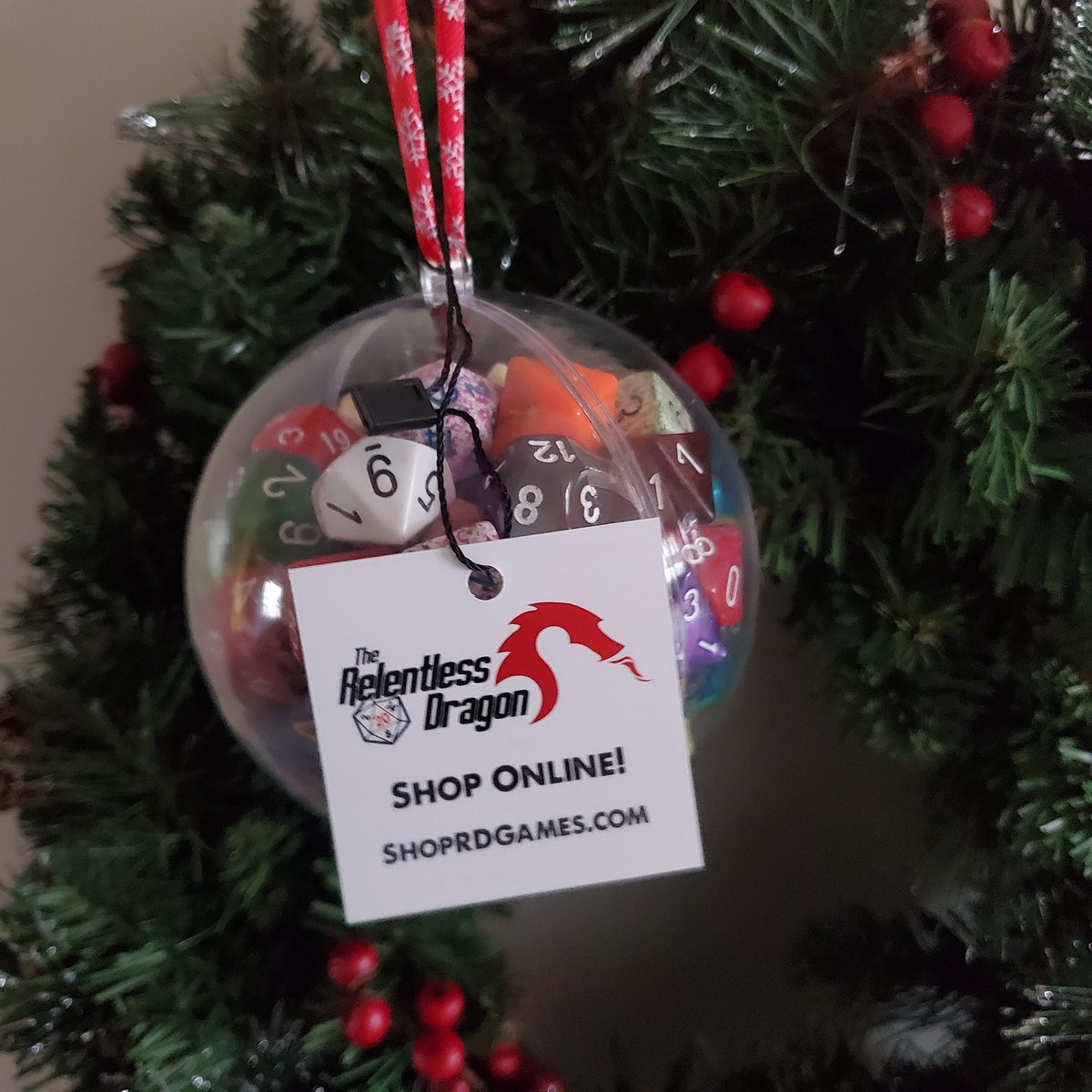 dnd4awesome's tweet photo. Stopped by Relentless Dragon game shop in Nashua NH last week and picked up the physical copy of Tasha's and found a great dice ornament!    Remember to keep supporting those local game shops! https://t.co/13ssA8fhmj