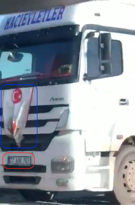 The license plates - '27 HC 437' & '27 AHB 763' show both of them to be registered in the province of Gaziantep. The trucks also each have a banner hanging on the front of the cabs, appearing to have some sort of state insignia (5/10)