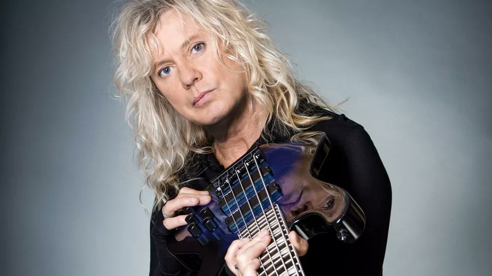 Happy birthday Rick Savage Def Leppard born December 2, 1960. 