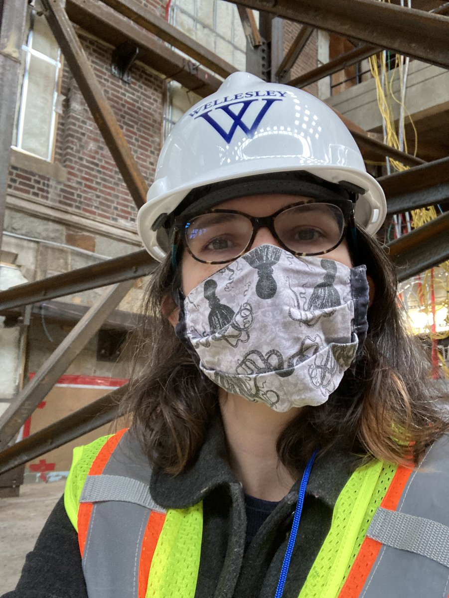 Lisa wears a W hard hat in the Science Center construction zone
