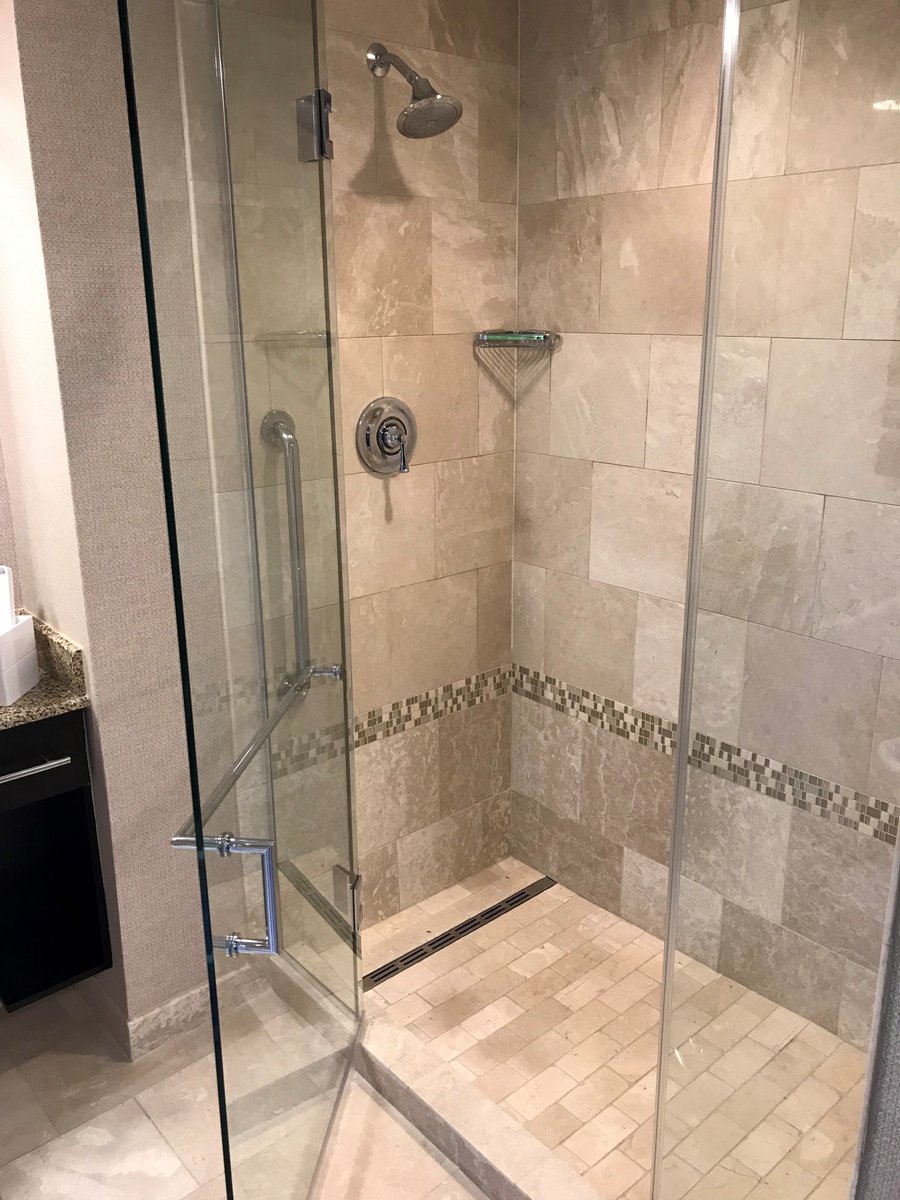 Oatey_Co's tweet photo. With warm toned tiles and a QuickDrain linear drain, this bathroom in the @HiltonAmericasHouston looks like the ideal place to relax after a long day.
#lineardrain #hospitalitydesign #quickdrainusa #walkinshower #customshower #luxurybathroom #bathroomdesign #designinspo https://t.co/TvOsViMLav