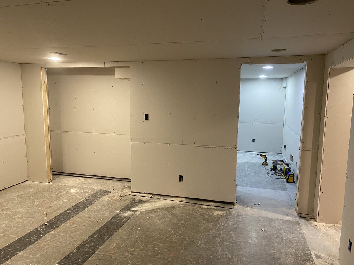 The same wall from the original tweet, now completely covered in drywall