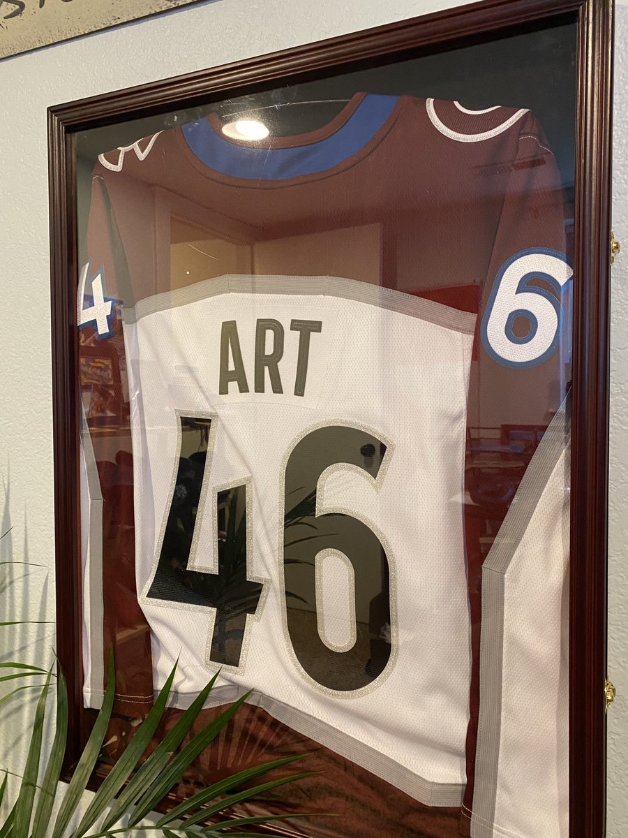 The bottle in the first picture was a tribute to how he celebrated the anniversary of every loved one's passing (yahrtzeit) with a sip of scotch. They also got me this jersey, which sits behind me in every meeting as a reminder of the guy who really made all this happen.7/8