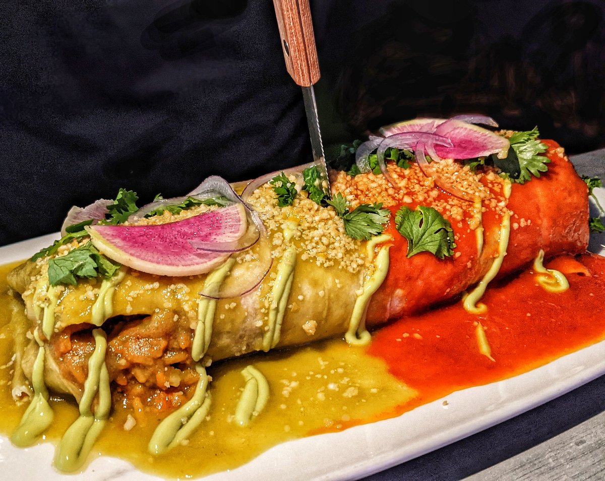 Check out this smothered burrito from Guac star in Tempe Az. Is it Christmas yet? #Vegan #veganfood #comidavegana #burrito