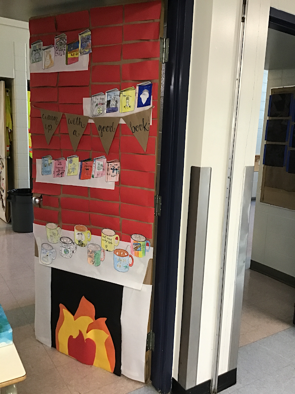 EdgemontDewit's tweet photo. Decorating doors at @EdgemontCBE! Room 12 decided to make our door into a cozy fireplace, adding our favourite books on the shelves. Some book covers are drawn on mugs of hot chocolate to make it extra cozy! Warm up with a good book! https://t.co/EkGH3bdSHC