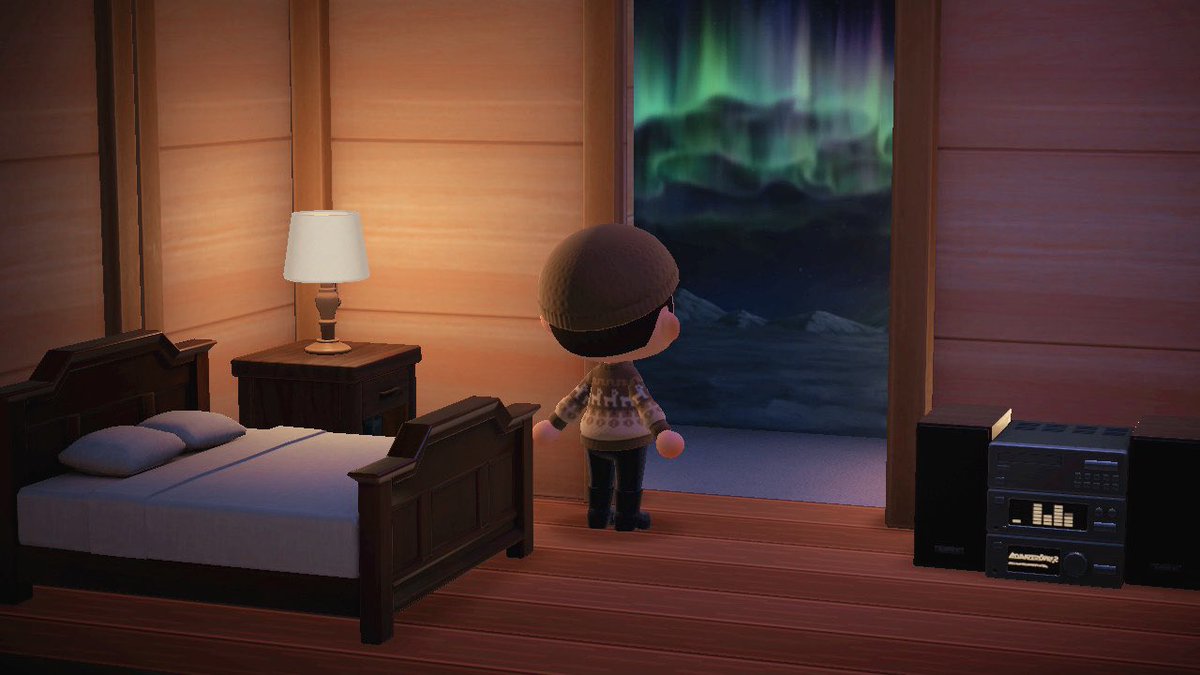 OtterIsle's tweet photo. LOVING the new Aurora Wall special for December. It really adds a nice winter touch to my bedroom! Swapped it with the Starry Sky wallpaper. #AnimalCrossing #ACNH https://t.co/vLxEEnfjmm