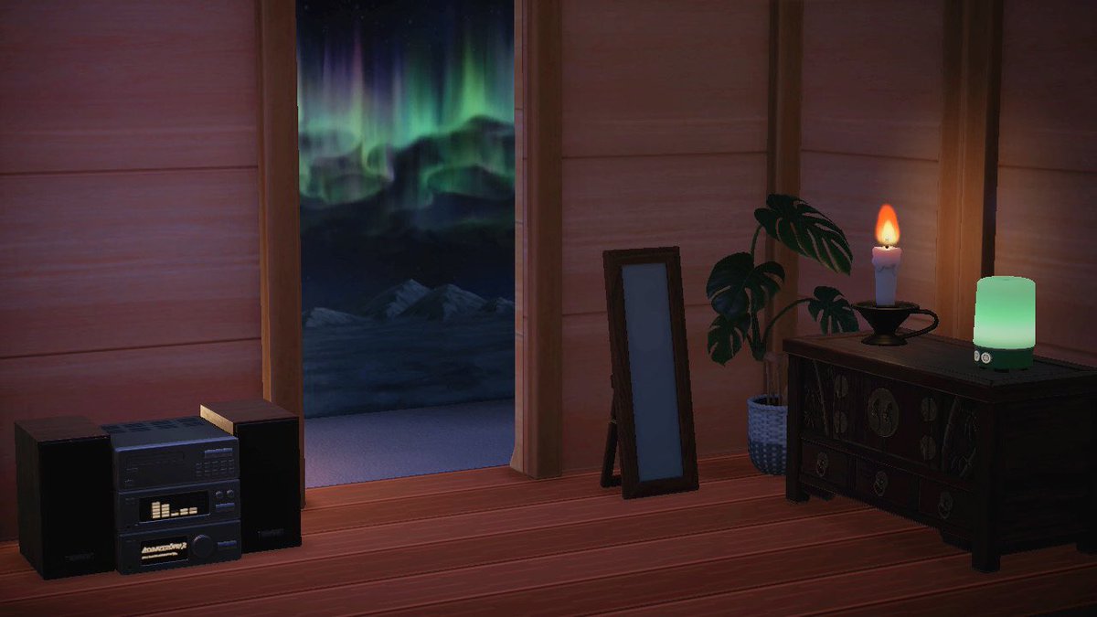 OtterIsle's tweet photo. LOVING the new Aurora Wall special for December. It really adds a nice winter touch to my bedroom! Swapped it with the Starry Sky wallpaper. #AnimalCrossing #ACNH https://t.co/vLxEEnfjmm