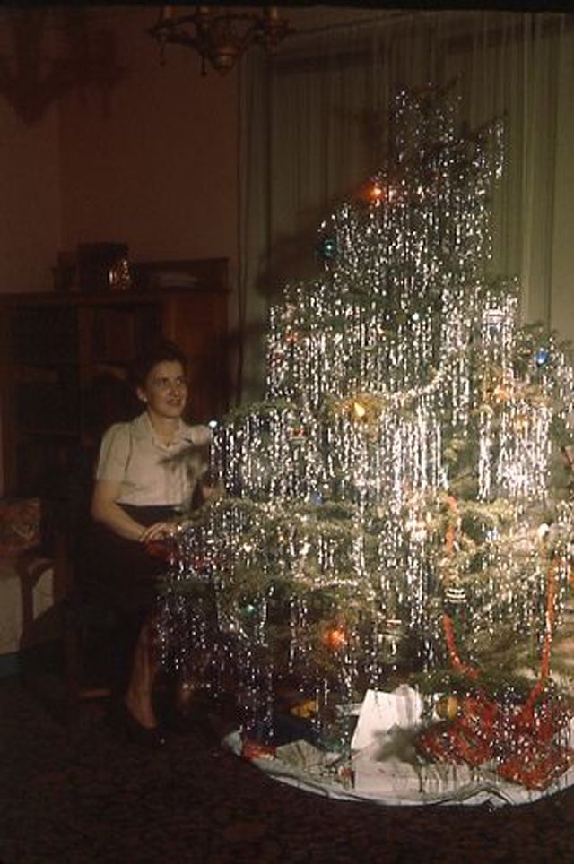 Photos of women posing with their Christmas trees (1950s/60s)Love them all.Enjoy!!