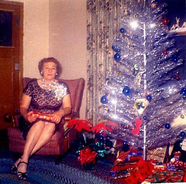 Photos of women posing with their Christmas trees (1950s/60s)Love them all.Enjoy!!