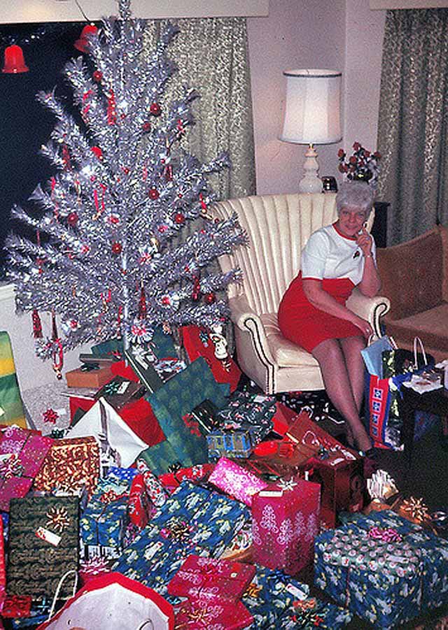 Photos of women posing with their Christmas trees (1950s/60s)Love them all.Enjoy!!